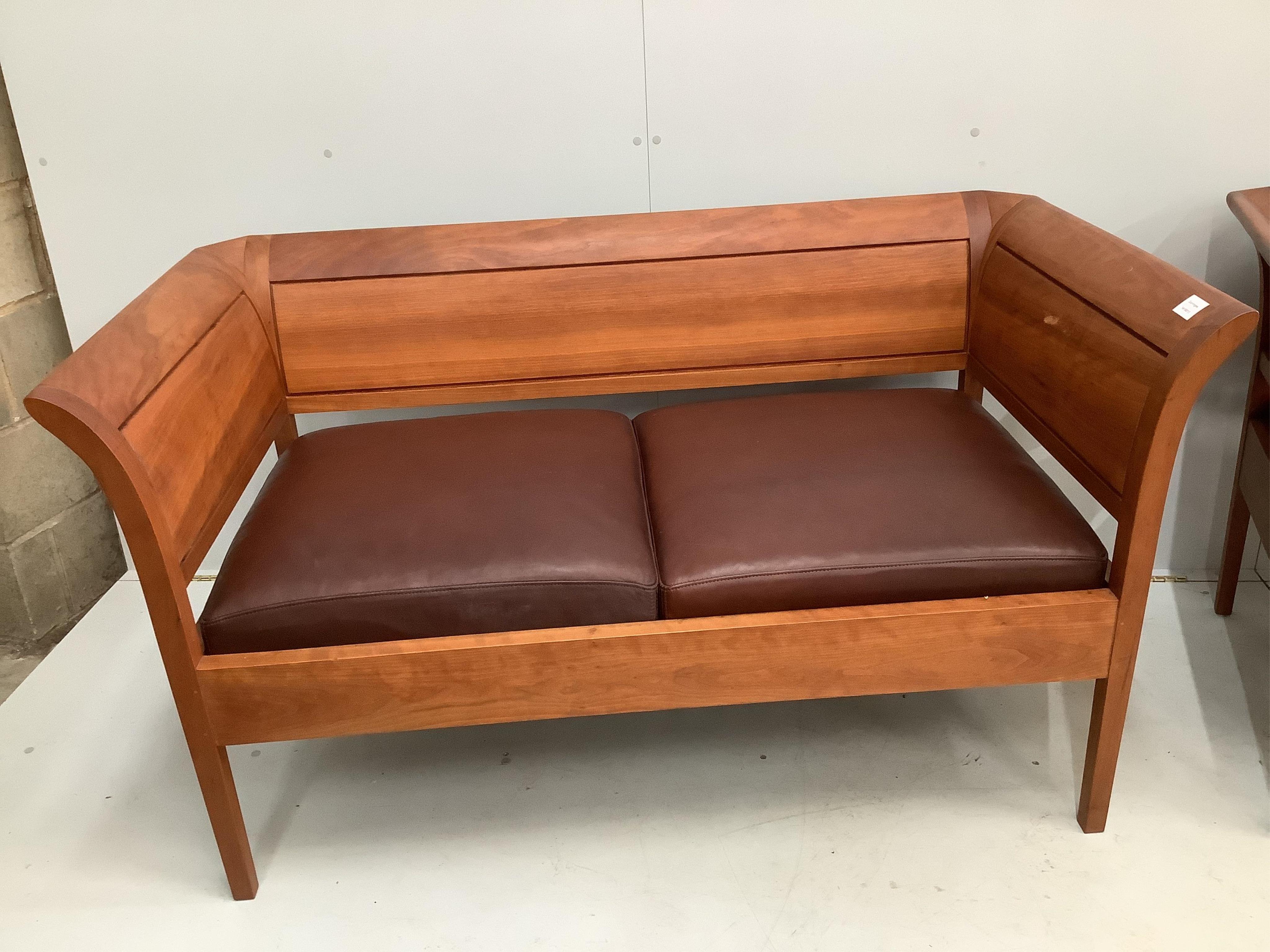 A pair of Thomas Moser cherrywood ‘Sofia two-place’ sofas, width 145cm, depth 76cm, height 80cm. Condition - good